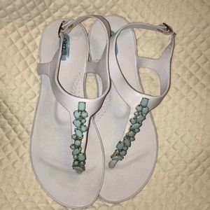 oka B white sandals with teal gemstones